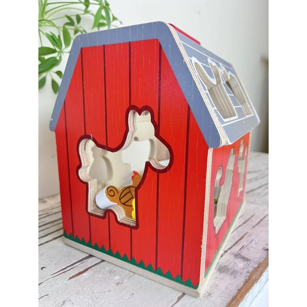 Melissa & Doug Wooden Take-Along Shape Sorting Barn with Flip-Up Roof 9 Figures